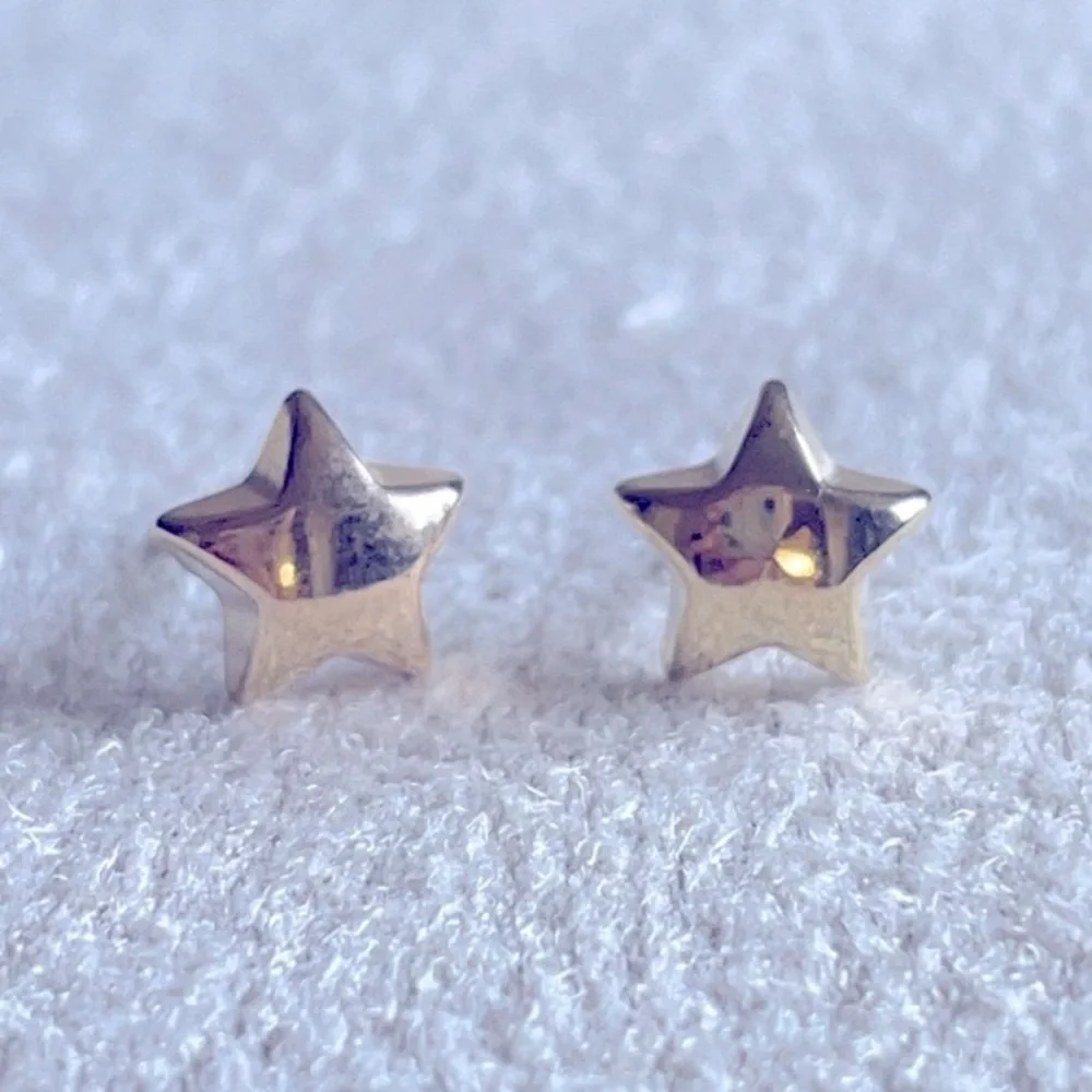 Stubby Star shaped gold earring studs